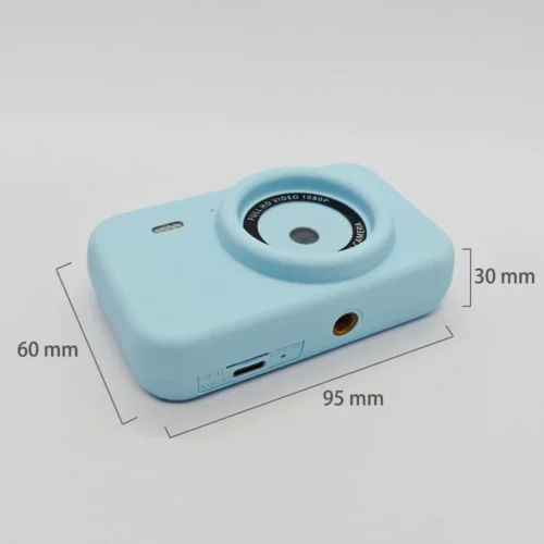 Qisora Blue Y1 kids digital camera with stand dimensions: 95 mm long, 30 mm wide, 60 mm high.