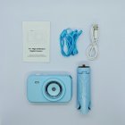 Wholesale Y1 high-definition kids camera set including blue digital camera, tripod stand, lanyard, and USB charging cable.