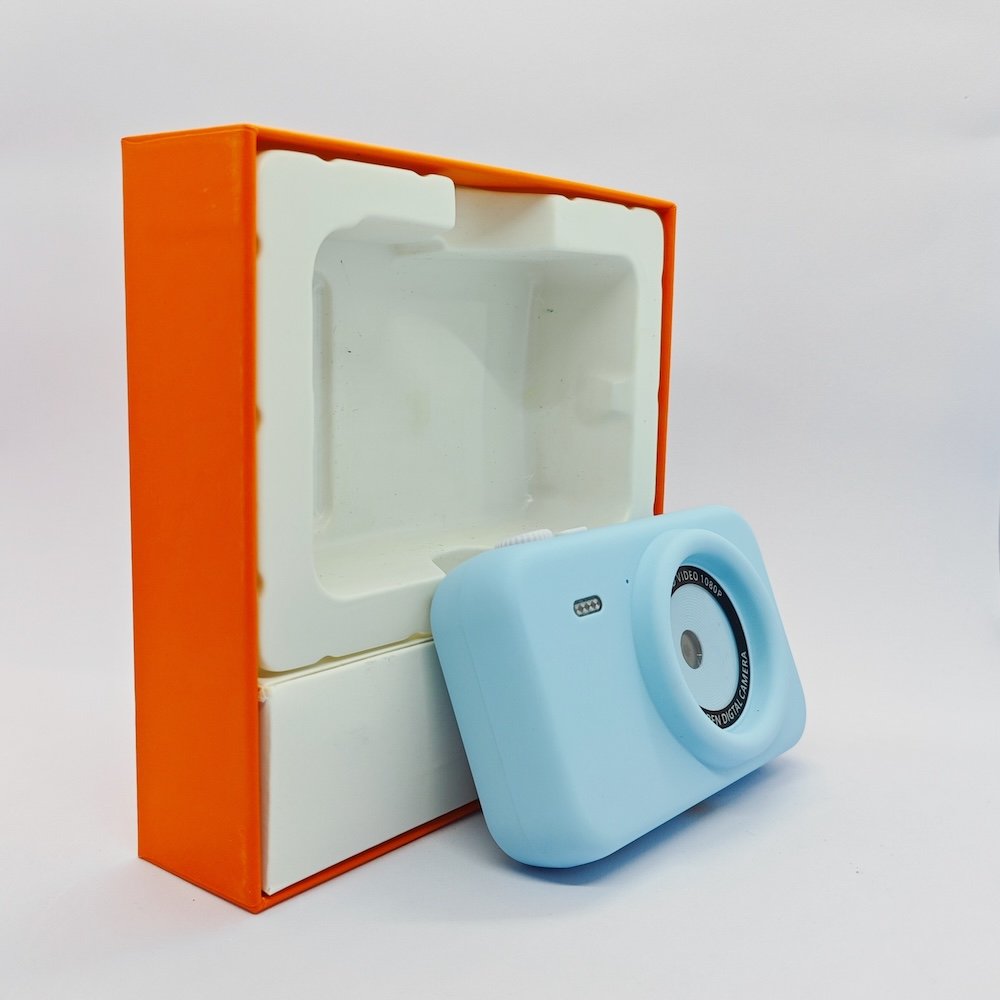 Premium orange gift box packaging for Y1 kids tripod camera, ready for retail display and international shipping.