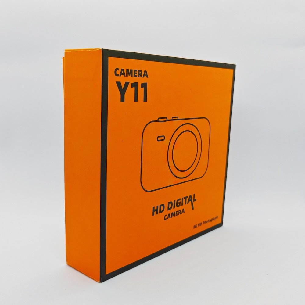 Details of orange packaging box for Y1 kids tripod camera.
