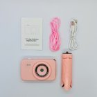 Wholesale Y1 high-definition kids camera set including pink digital camera, tripod stand, lanyard, and USB charging cable.