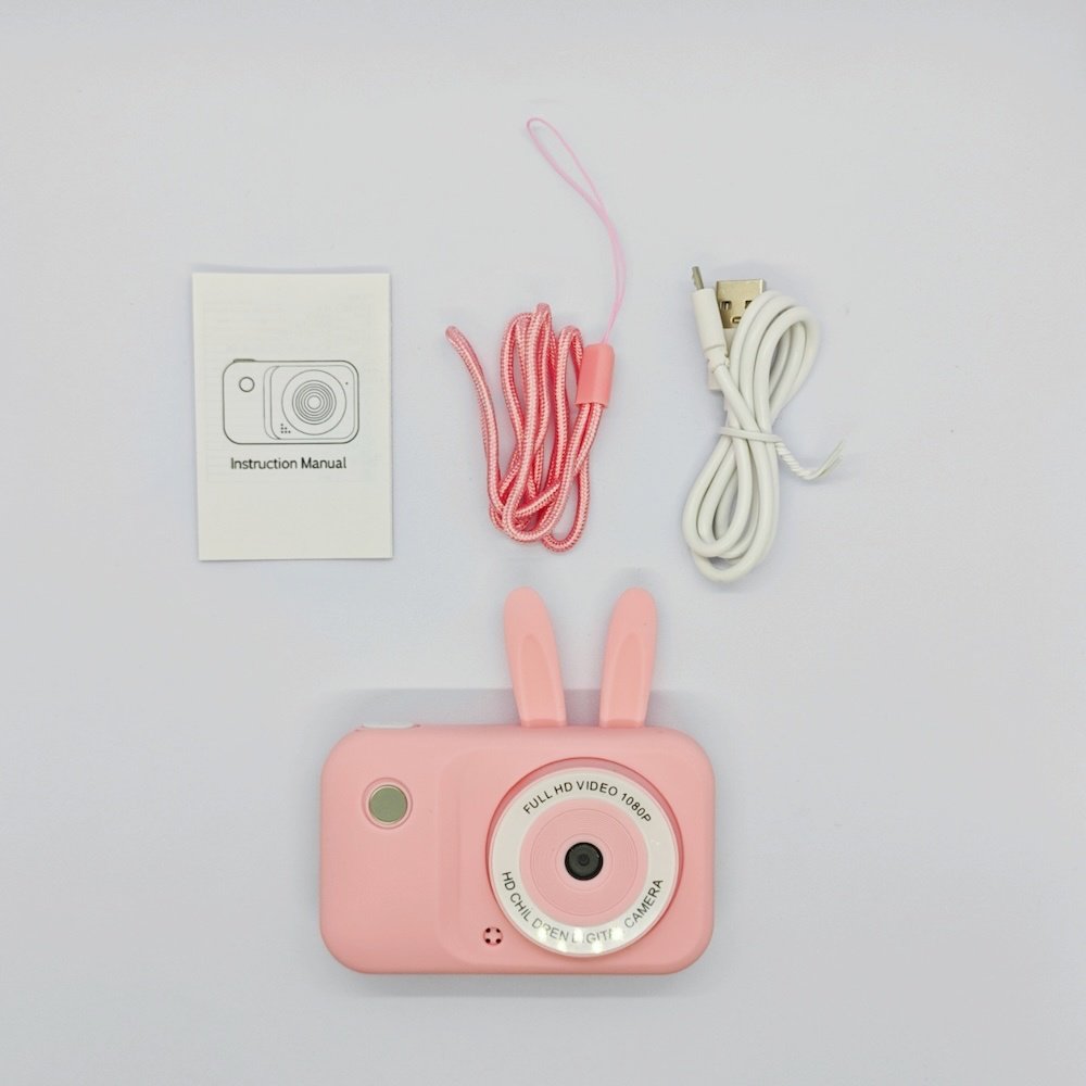 Complete package of Y2 bunny kids camera in pink with USB cable, lanyard and instruction manual - B2B children's electronics supplier.