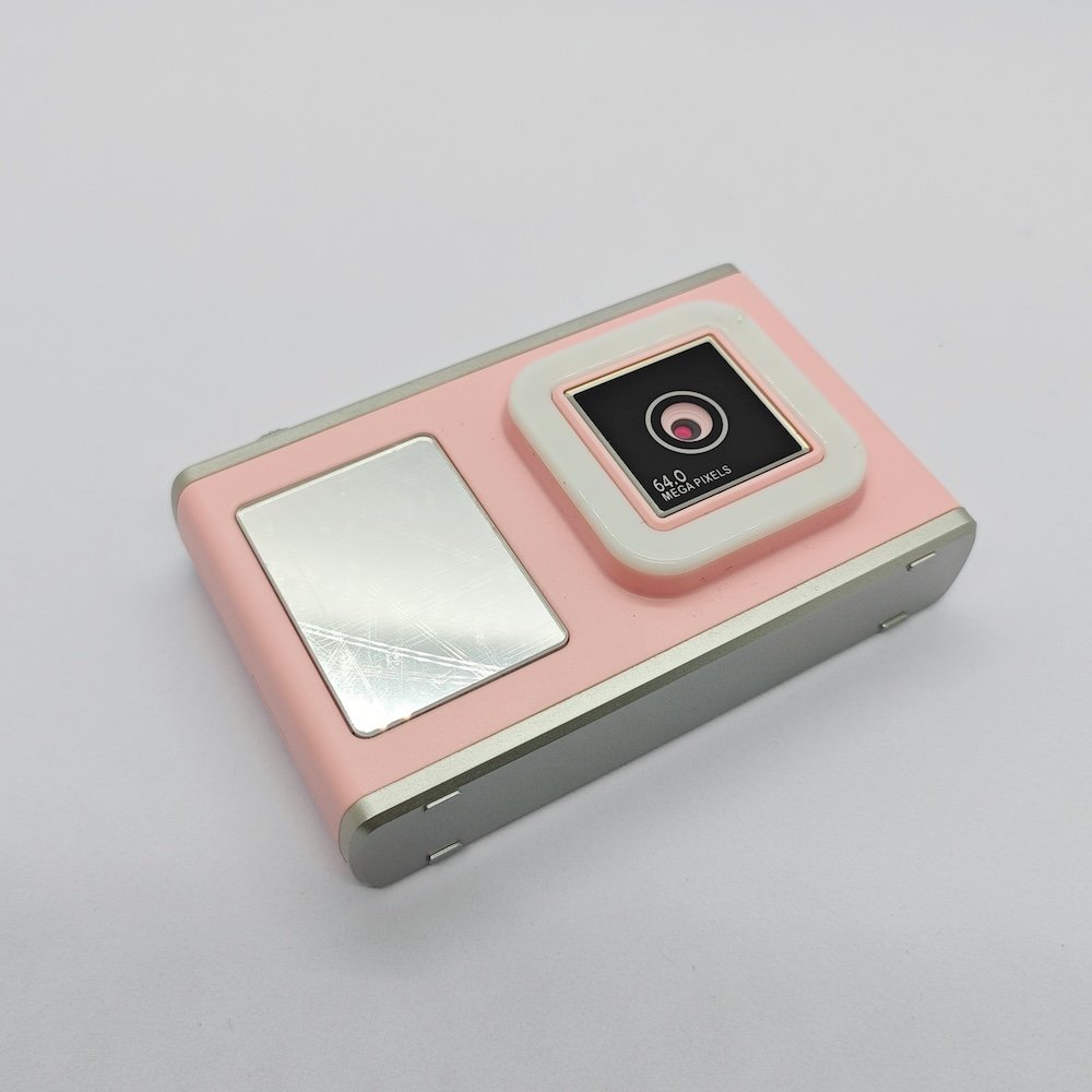 Close-up of Y23 pink kids portable camera with square front lens, high-resolution imaging technology for kids tech toy distributors.