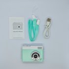 Complete package of Y3 retro kids digital camera in green with USB cable, lanyard and instruction manual - B2B wholesale kids electronics.