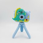 Y6 dual lens kids selfie camera with cute blue dinosaur protective cover and stable tripod mount for B2B toys distributors.