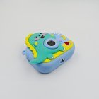 Y6 compact lightweight toy camera for kids, features classic design with 3D blue dinosaur elements for bulk order.