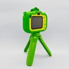 Y6 HD display children's camera with easy-to-use buttons, integrated green dinosaur silicone sleeve for retailers.