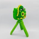 CE certified Y6 durable children digital camera with shockproof green dinosaur cover, features USB charging port and SD card slot.