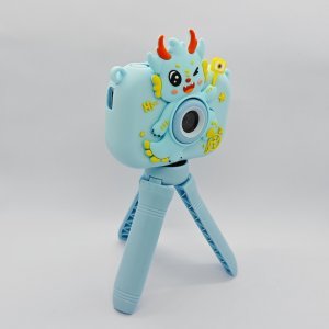 Y6 shockproof silicone kids camera with 3D blue dragon scales, features USB-C port and memory card slot for retail.
