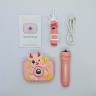 Wholesale full kit of Y6 kids camera with Chinese Dragon silicone case in pink, detachable tripod, lanyard, USB cable and manual.