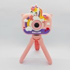 Y6 dual lens kids selfie camera with cute pink smile unicorn protective cover and stable tripod mount for B2B toys distributors.
