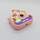 Top view of compliant Y6 kids tripod camera with pink smile unicorn silicone case without stand.
