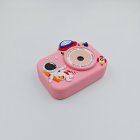 Top view of Y8 pink kids camera with astronaut and spaceship design silicone case, dual lens.
