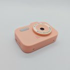 Top view of Y8 kids pink digital camera with classic design, featuring charging port and memory card slot.