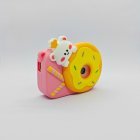 Y8 children's digital camera with a pink silicone case, featuring a yellow doughnut design on it for gift distributors.