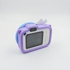 Back view of CE/RoHS certified Y8 donut kids camera with purple silicone case, featuring an HD 2.0-inch screen and white buttons.