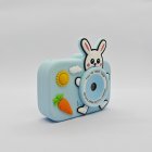 Wholesale Y8 kids toy camera with rabbit and carrot on blue silicone case, showing HD front lens, China factory.