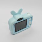 Back view of Y8 kids digital camera with blue rabbit&carrot silicone case, HD selfies camera, rear screen and white buttons, CE certified.