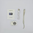 White M8 kids camera gift set with USB cable, lanyard and manual for international export.