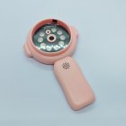 Close-up Y11 pink handheld microscope lens with integrated LED fill lights and speakers for kids toy wholesalers.