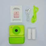 CE/RoHS compliant green instant camera set for kids, includes 2 rolls of thermal paper, OEM/ODM factory direct wholesale.