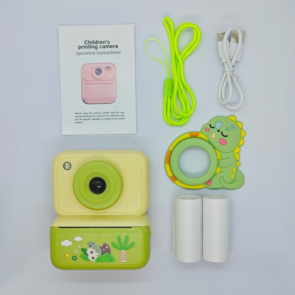 Full set of blue Dinosaur instant camera for kids, includes 2 rolls of thermal paper, lanyard and cable, factory price.