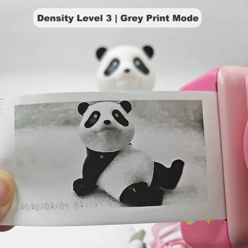 Real black-and-white thermal paper print sample of Y350 unicorn kids instant print camera, showing high-contrast output in grey print mode at density level 3.