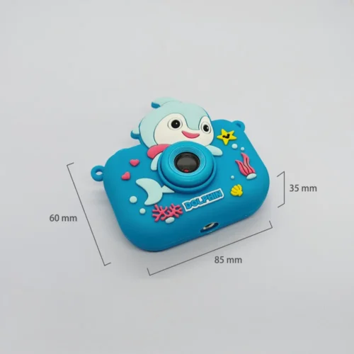 Dimension chart of the Qisora Y6 Dolphin kids camera showing its size: 85 mm length, 35 mm thickness, 60 mm height.