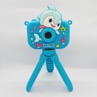 Wholesale Y6 dual lens children's digital camera featuring a blue dolphin design and adjustable mini tripod.