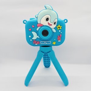 Wholesale Y6 dual lens children's digital camera featuring a blue dolphin design and adjustable mini tripod.