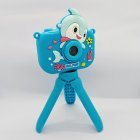 Side view of Y6 kids camera with blue dolphin protective silicone case and stand for toys importers.