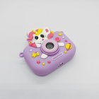 Top view of compliant Y6 kids tripod camera with purple ice cream unicorn silicone case without stand.