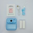 Complete kit of blue Y900 kids print camera, includes 2 rolls of thermal paper, lanyard and cable. RoHS/FCC certified toys for distributors.