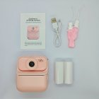 Complete kit of pink Y900 kids print camera, includes 2 rolls of thermal paper, lanyard and cable. RoHS/FCC certified toys for distributors.