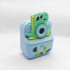 Wholesale Y900 dinosaur-themed kids instant print camera with blue Dino silicone cover for toy importers.