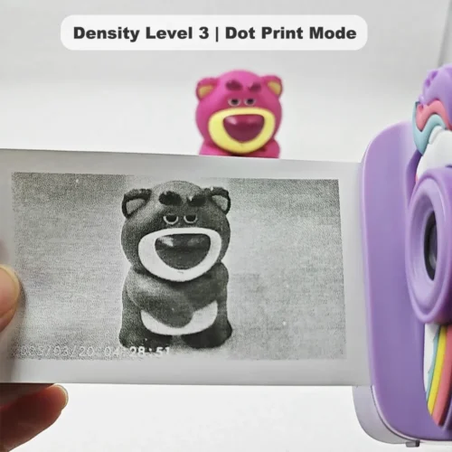 Real black-and-white thermal paper print sample of Y900 unicorn kids instant print camera, showing high-contrast output in dot print mode at density level 3.