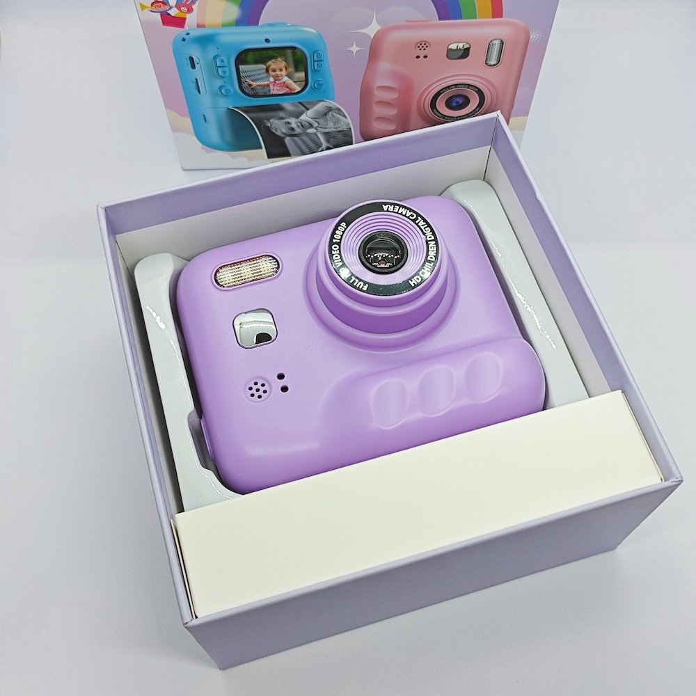 Sample gift packaging of kids camera, including protective color box and camera kit.